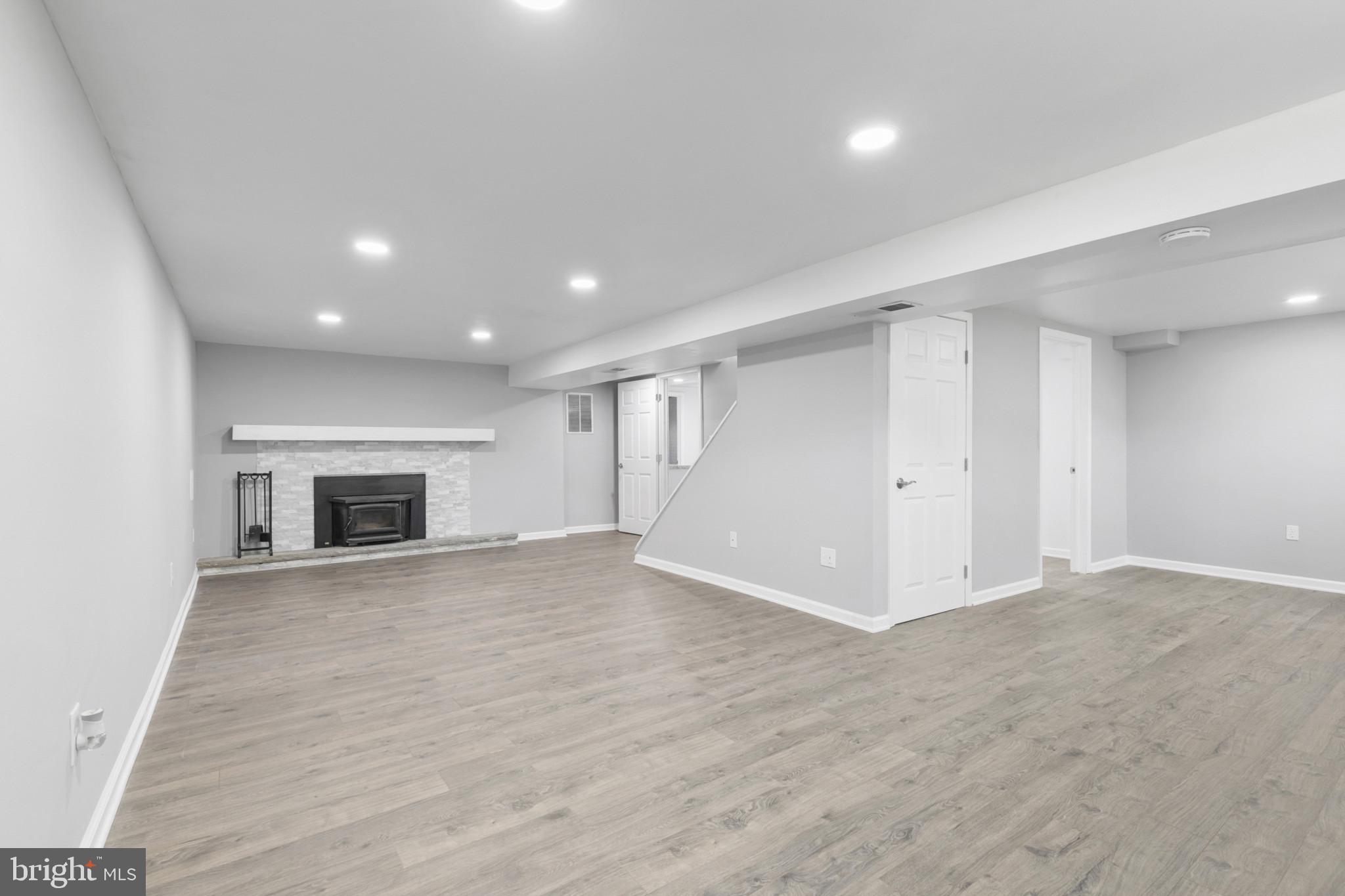 400 Bryanstone Road Owings Mills, MD 21117 - Photo 19 of 35 LL family room is 25 x 12 and has new LVP floor