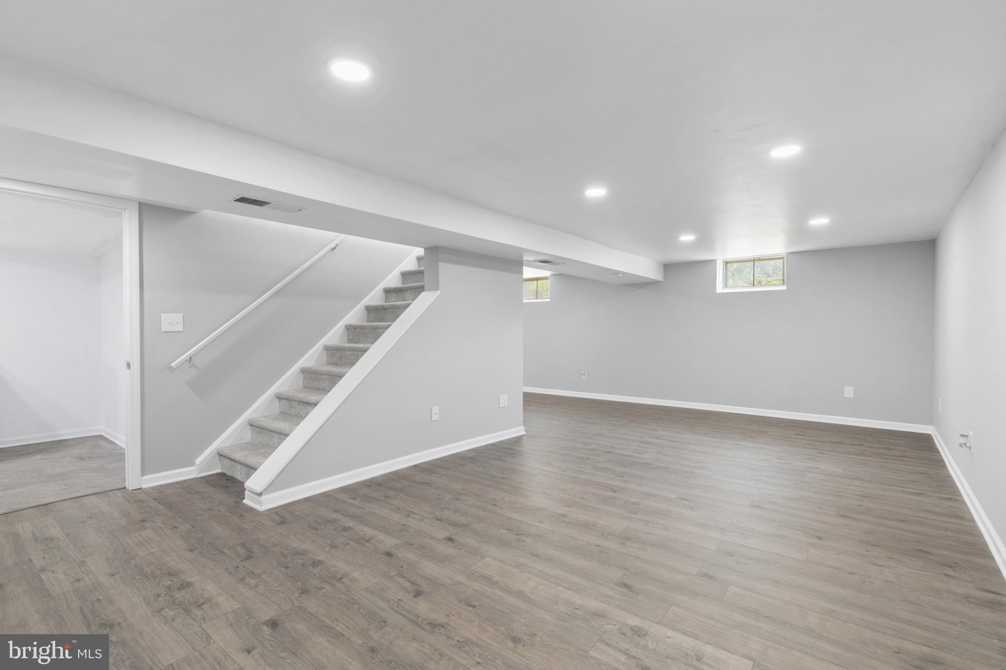 400 Bryanstone Road Owings Mills, MD 21117 - Photo 21 of 35 Family room has fresh paint and recessed lights