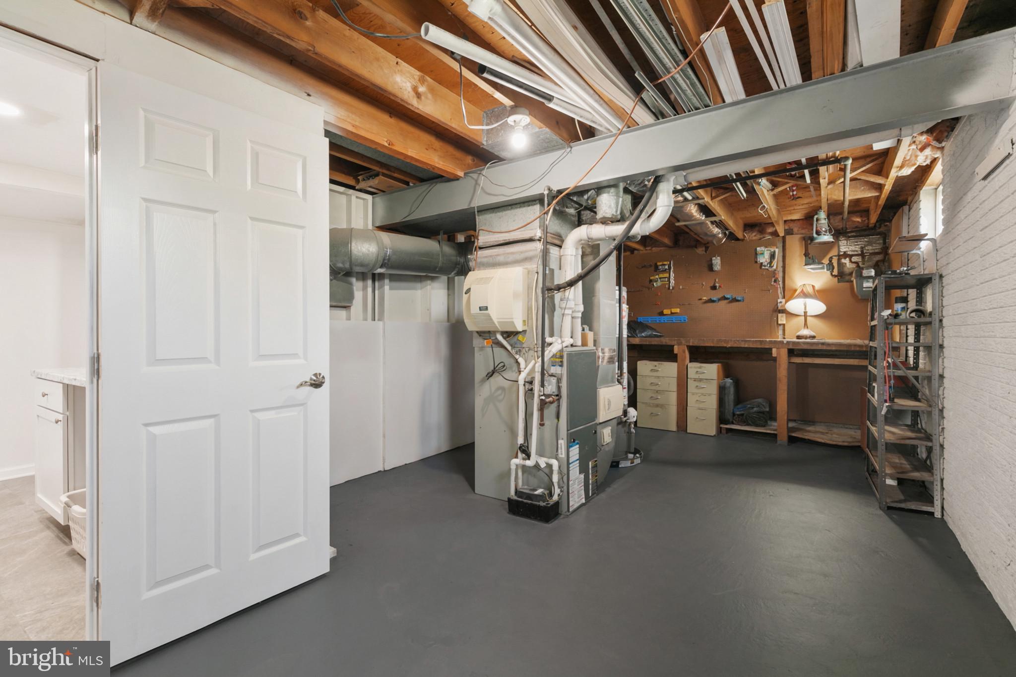 400 Bryanstone Road Owings Mills, MD 21117 - Photo 26 of 35 Storage room/workshop 25x12, gas water heater 2021