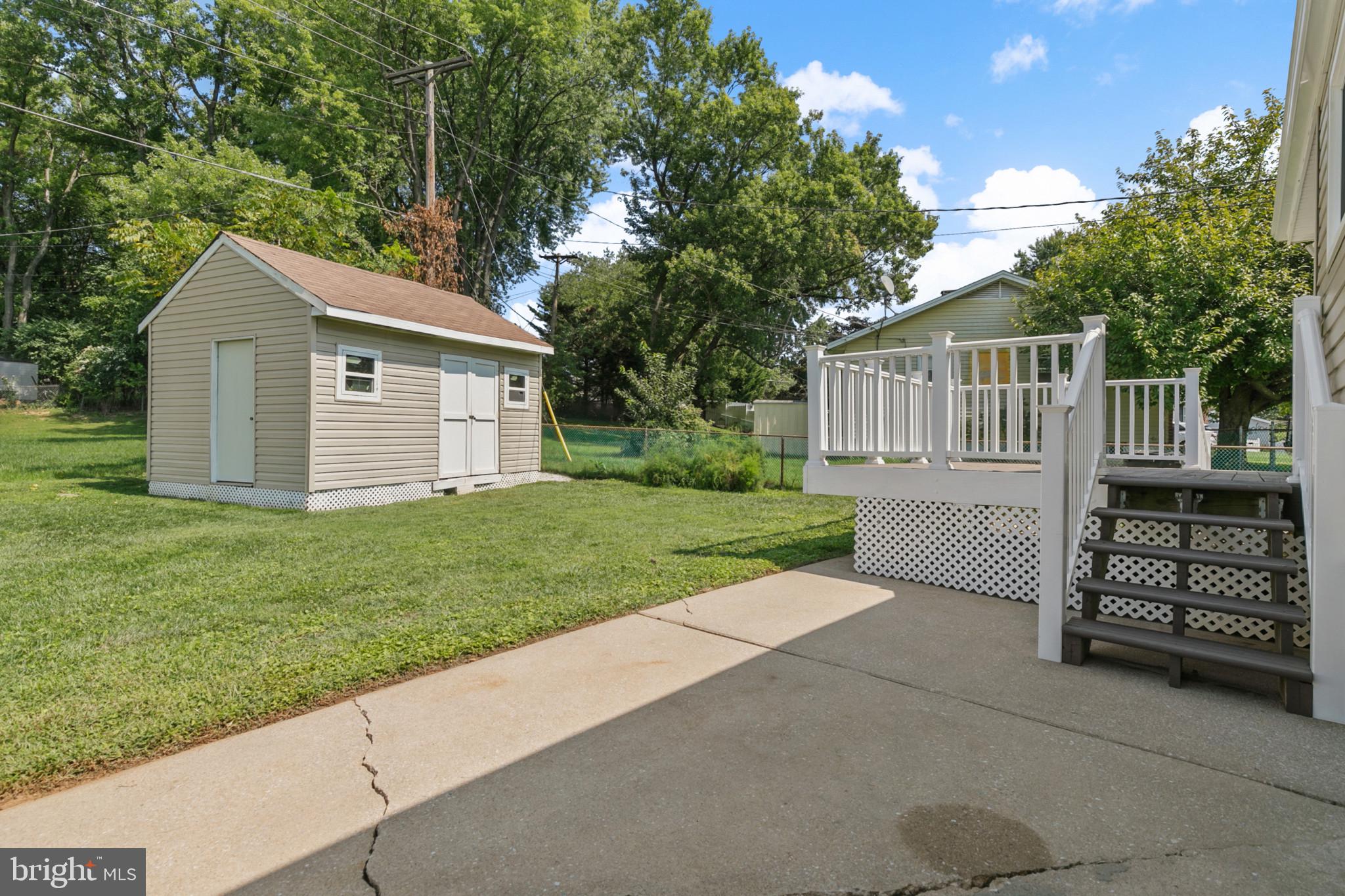 400 Bryanstone Road Owings Mills, MD 21117 - Photo 29 of 35 View of the deck, patio, shed and back yard