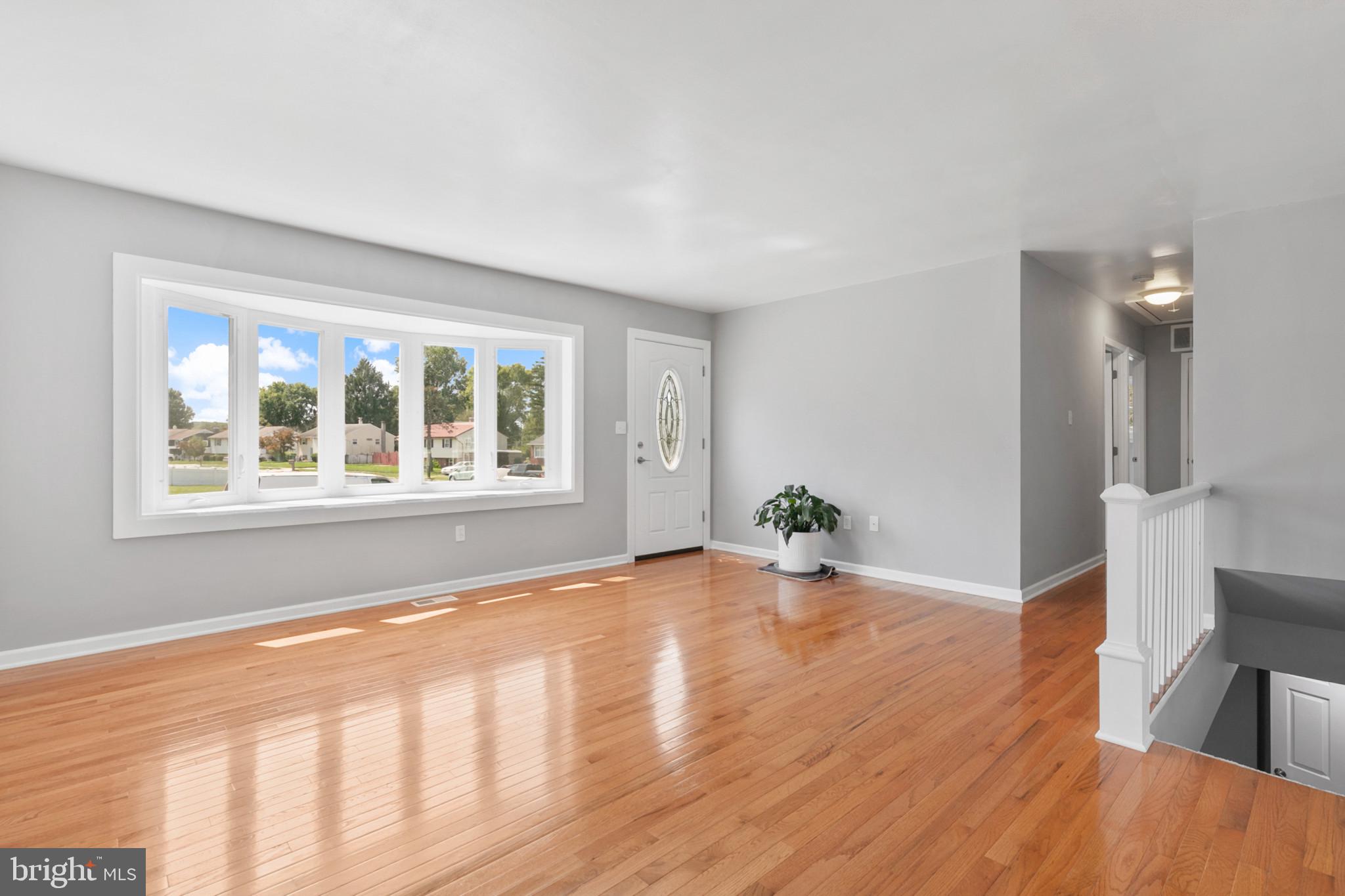 400 Bryanstone Road Owings Mills, MD 21117 - Photo 3 of 35 Living room has fresh paint & large bay/bow window