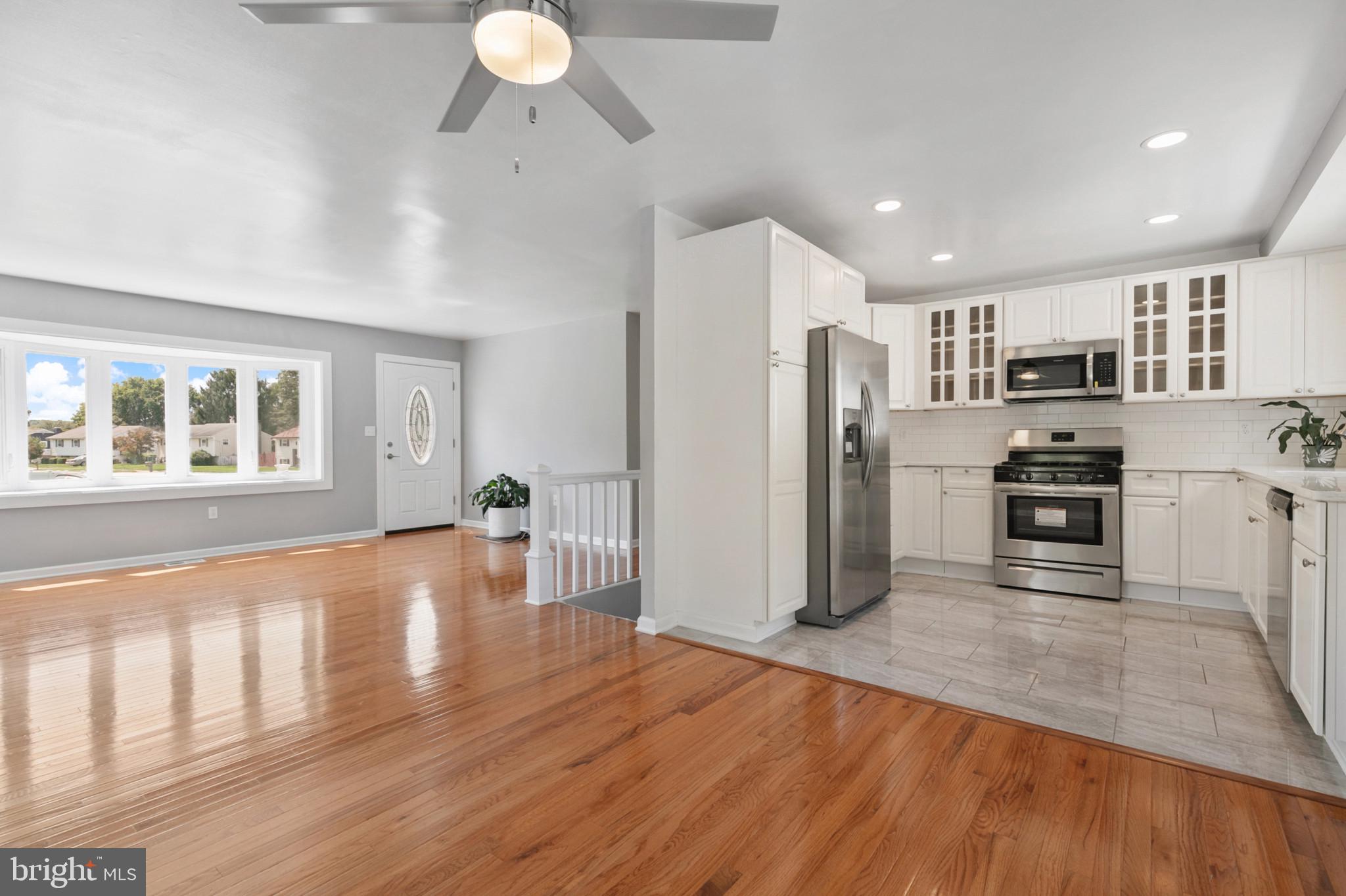 400 Bryanstone Road Owings Mills, MD 21117 - Photo 7 of 35 DR has fresh paint, new hardwood flr & ceiling fan