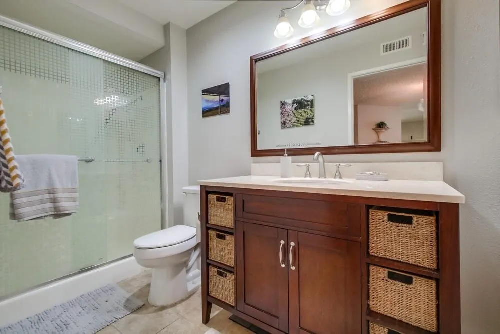 17617 Pomerado Road, Unit 215 San Diego, CA 92128 - Photo 27 of 50 a bathroom with a sink and a mirror