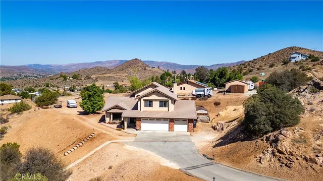 a view of a house with a mountain