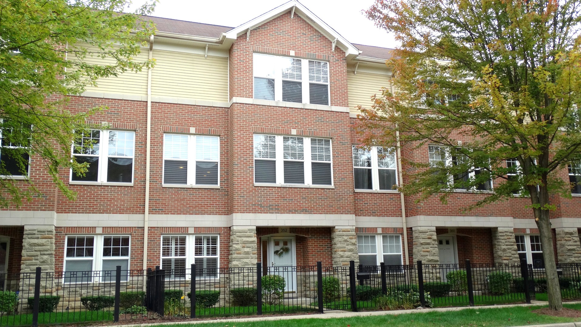 352 West Seminary Avenue, Unit 504 Wheaton, IL 60187 - Photo 1 of 24 front view of a brick house