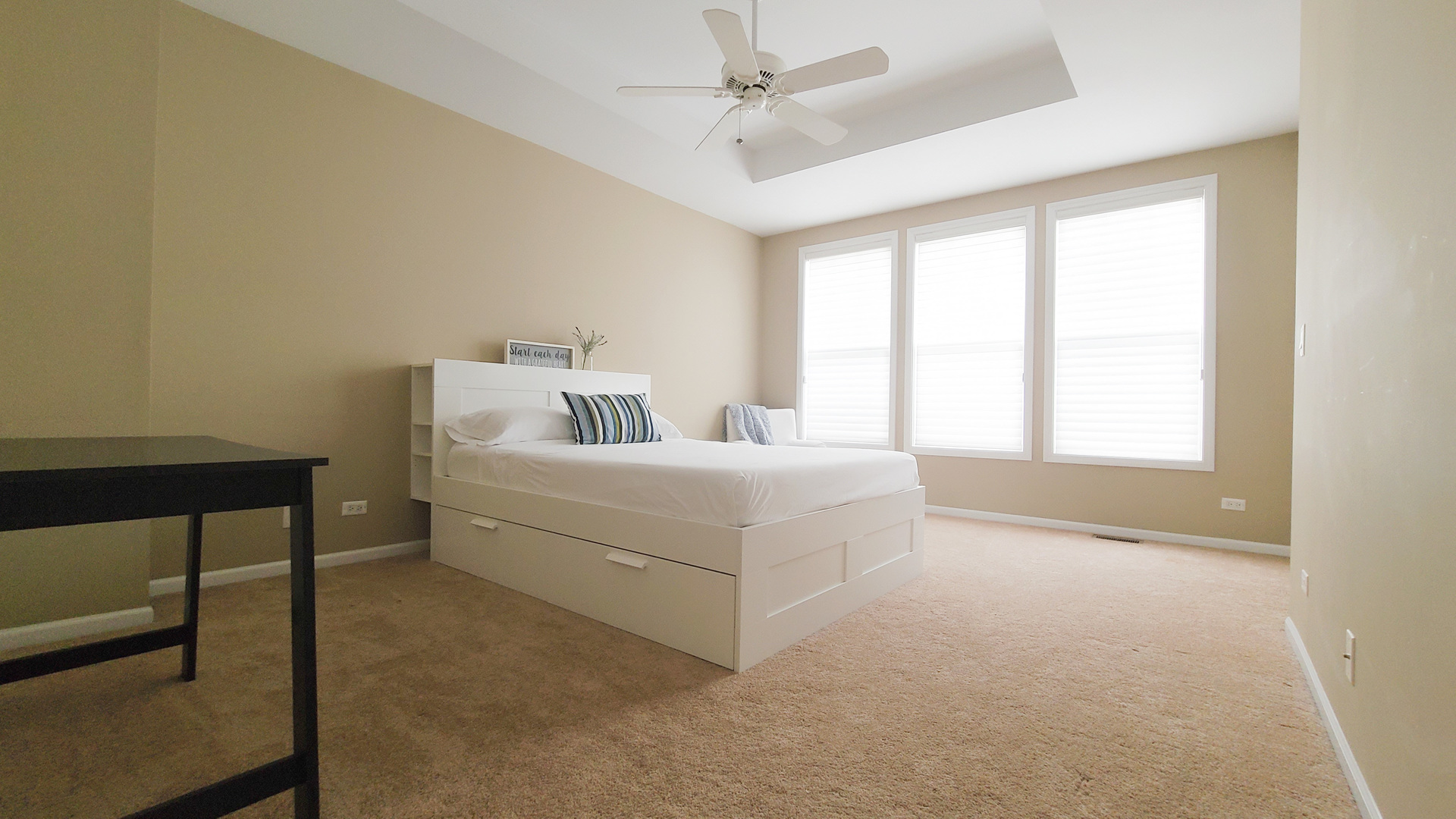 352 West Seminary Avenue, Unit 504 Wheaton, IL 60187 - Photo 14 of 24 a bedroom with a bed and a window