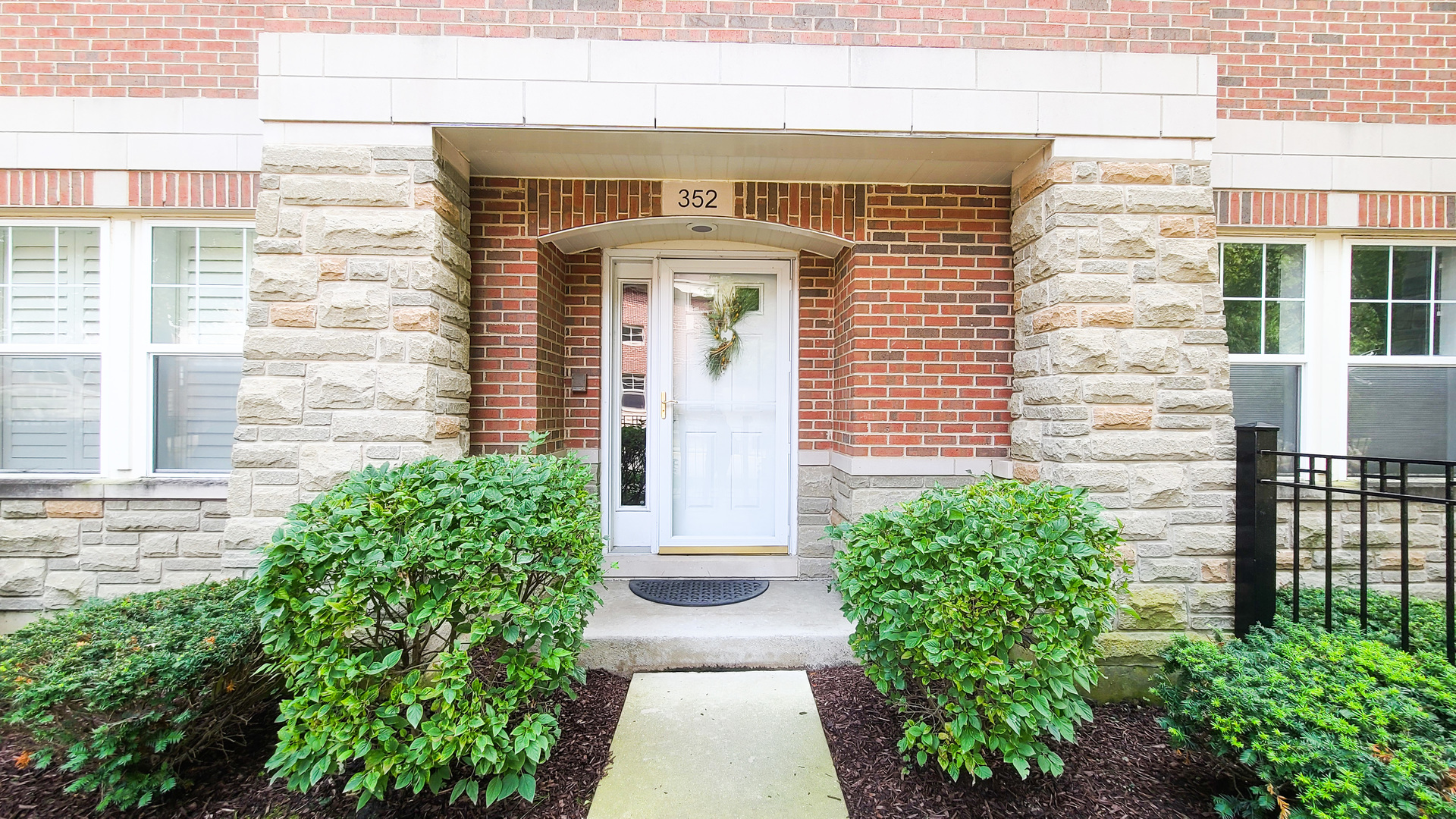 352 West Seminary Avenue, Unit 504 Wheaton, IL 60187 - Photo 2 of 24 a front view of a house