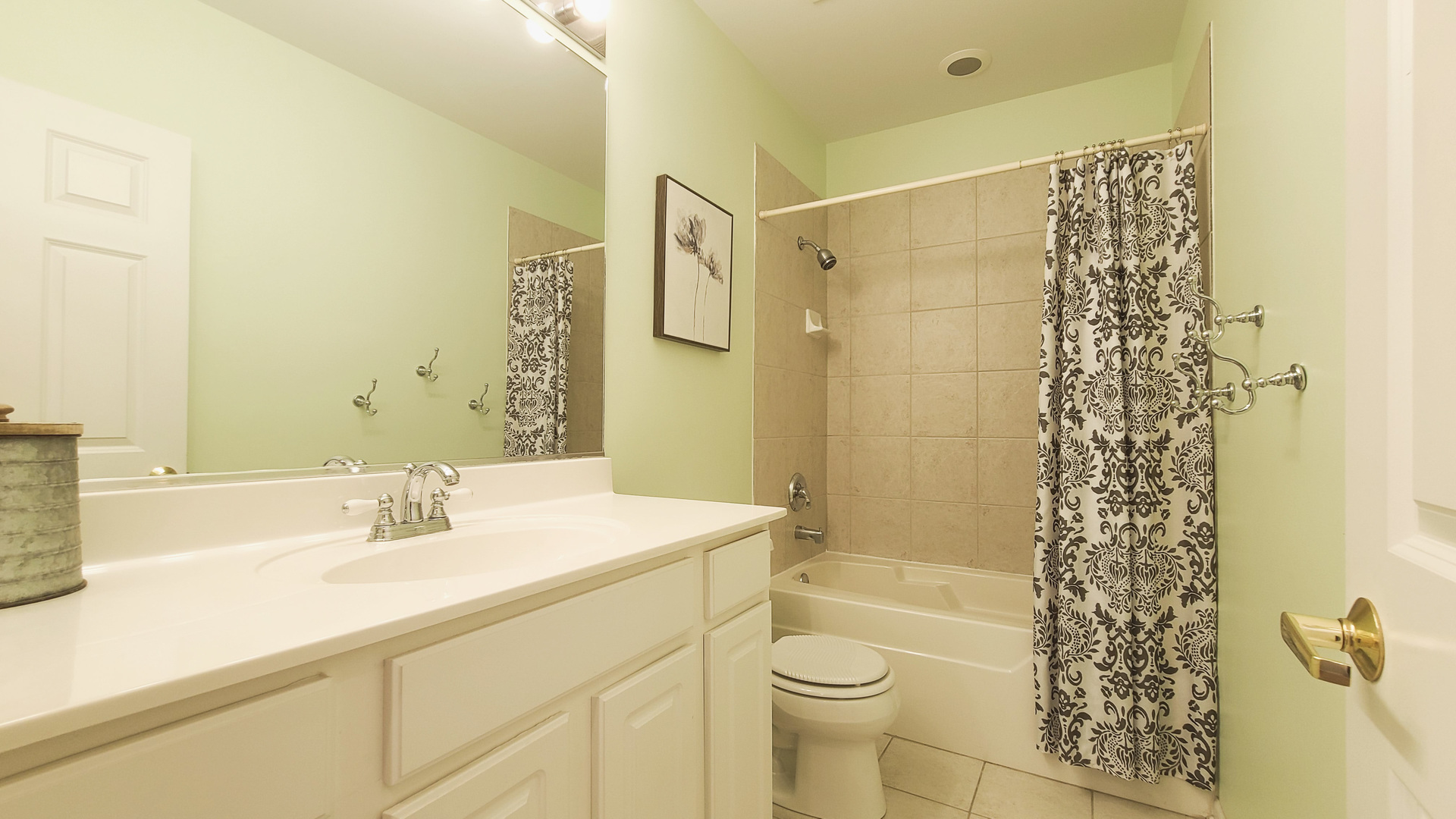 352 West Seminary Avenue, Unit 504 Wheaton, IL 60187 - Photo 22 of 24 a bathroom with a sink a toilet and shower