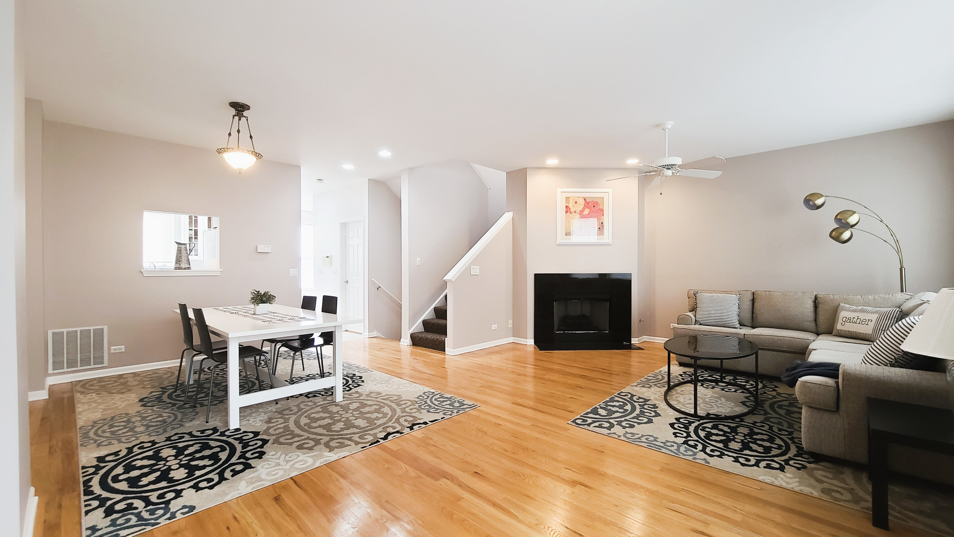 352 West Seminary Avenue, Unit 504 Wheaton, IL 60187 - Photo 6 of 24 a living room with furniture and a fireplace