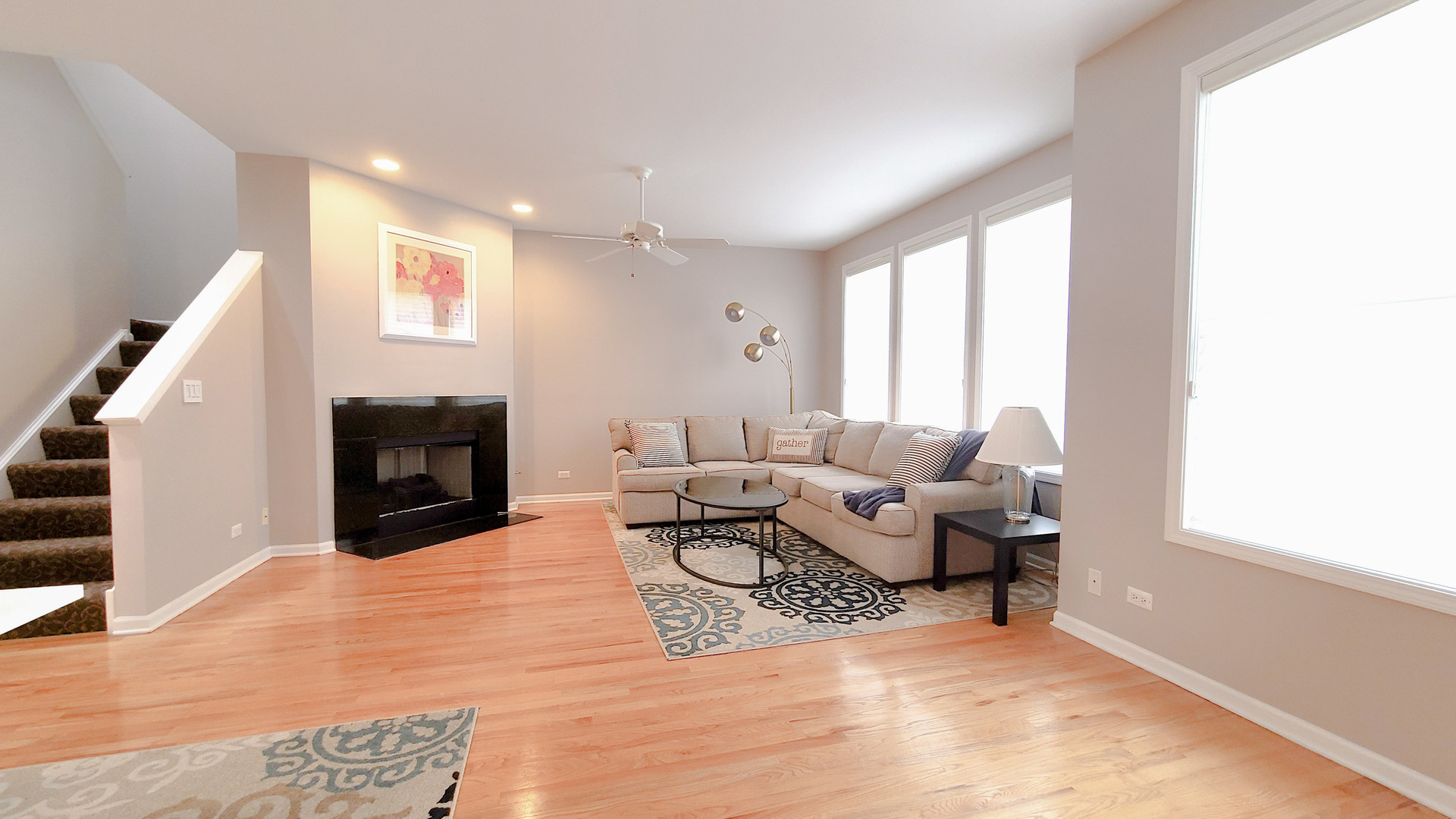 352 West Seminary Avenue, Unit 504 Wheaton, IL 60187 - Photo 7 of 24 a living room with furniture and a fireplace