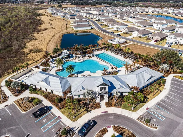an aerial view of a house with a garden