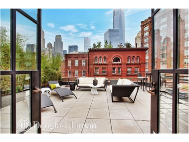 159 Duane Street, Unit PH Manhattan, NY 10013 - Photo 1 of 1 a living room with couches a coffee table and next to a large window with garden view