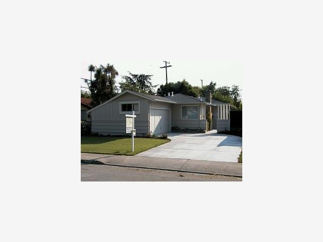 a picture of a house with a yard