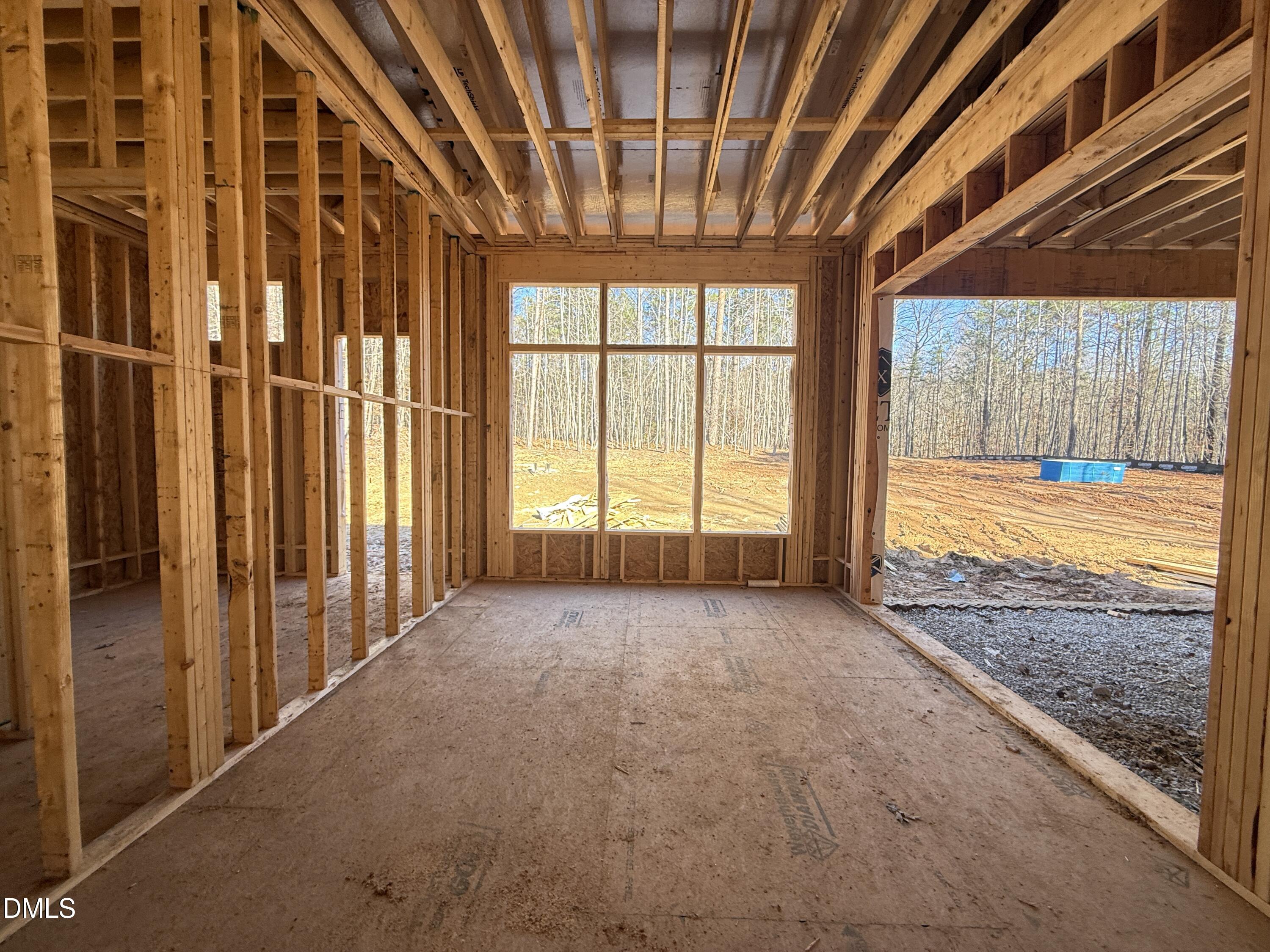 6820 Brixley Circle Raleigh, NC 27614 - Photo 12 of 35 a view of a room with wooden walls and floor to ceiling window