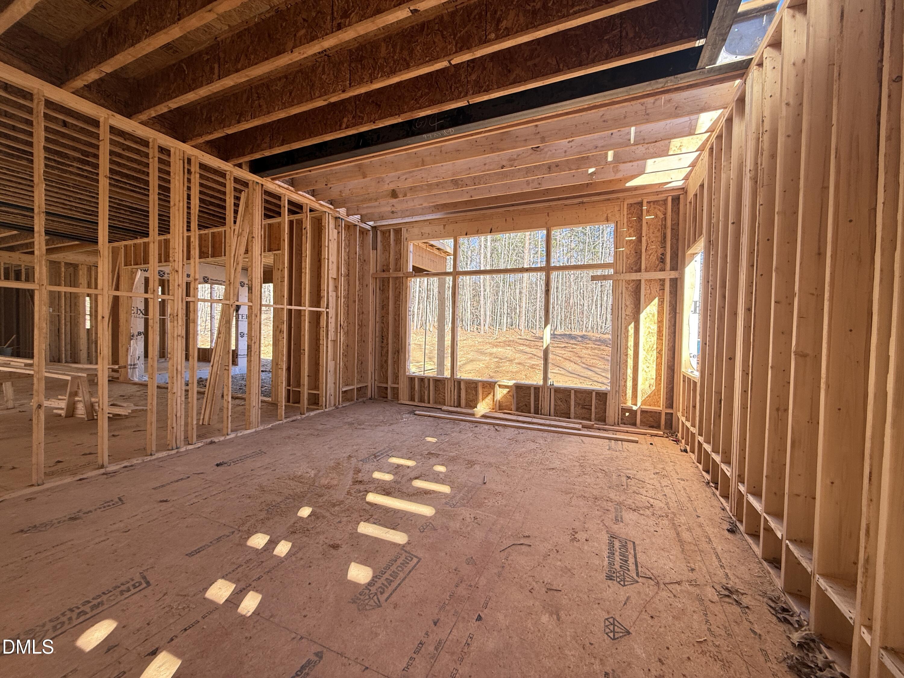 6820 Brixley Circle Raleigh, NC 27614 - Photo 17 of 35 a view of an empty room with a sliding door
