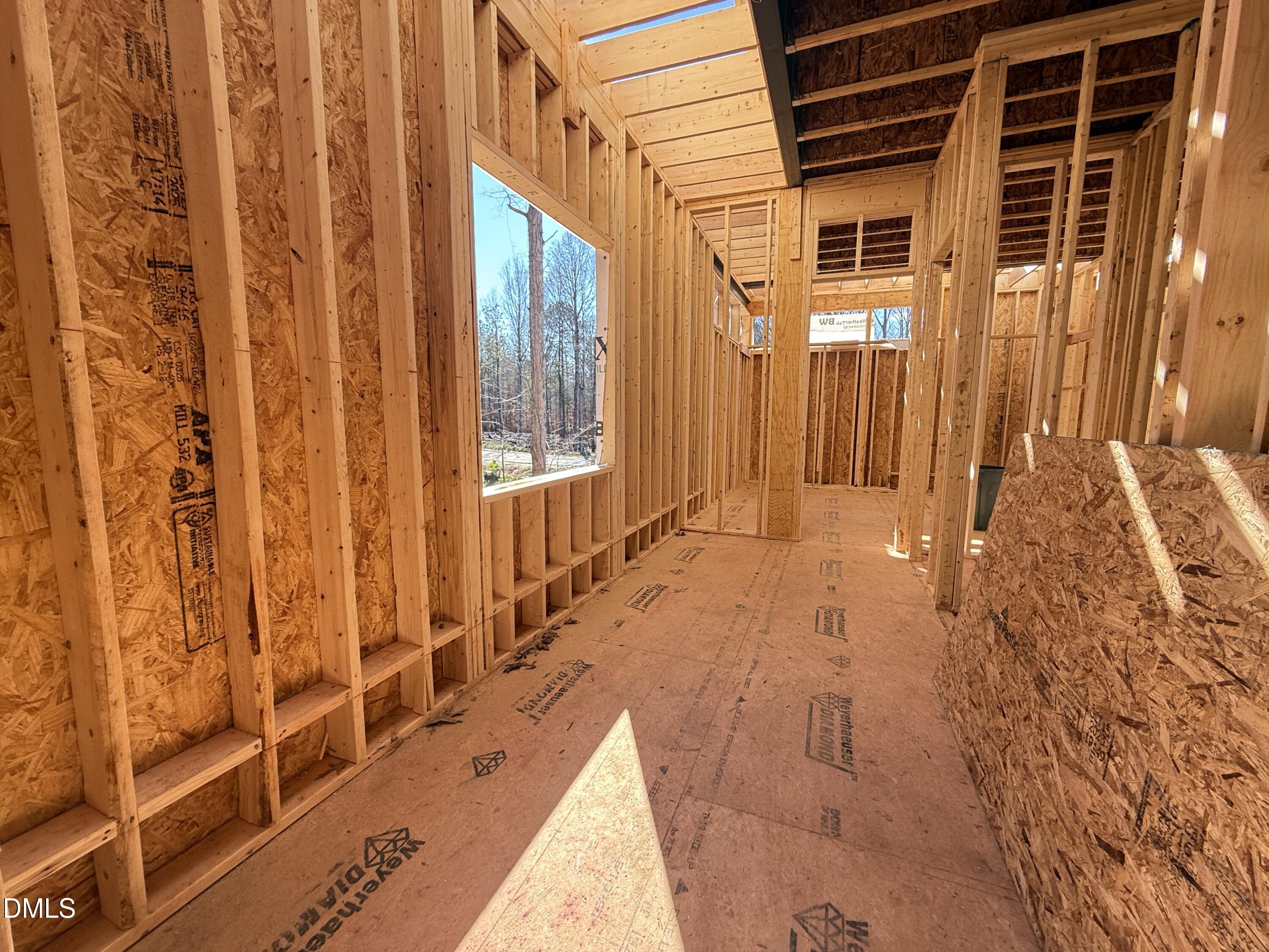 6820 Brixley Circle Raleigh, NC 27614 - Photo 18 of 35 a view of a balcony with wooden walls and floor to ceiling window
