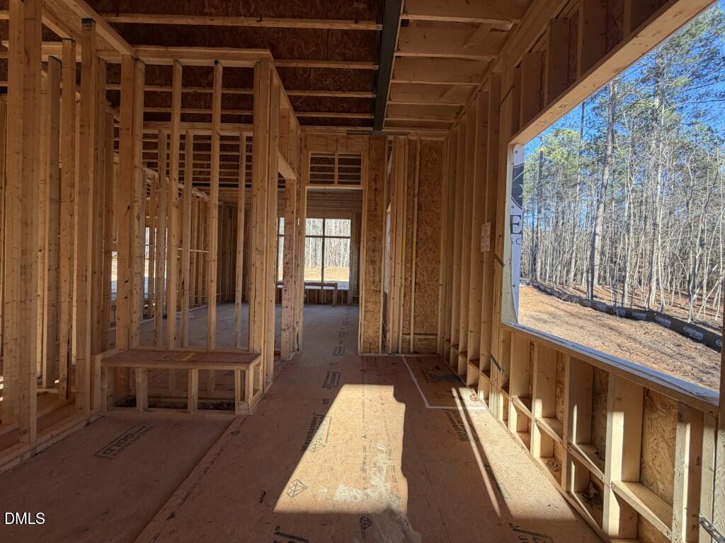 6820 Brixley Circle Raleigh, NC 27614 - Photo 21 of 38 a view of balcony with a couch and wooden floor