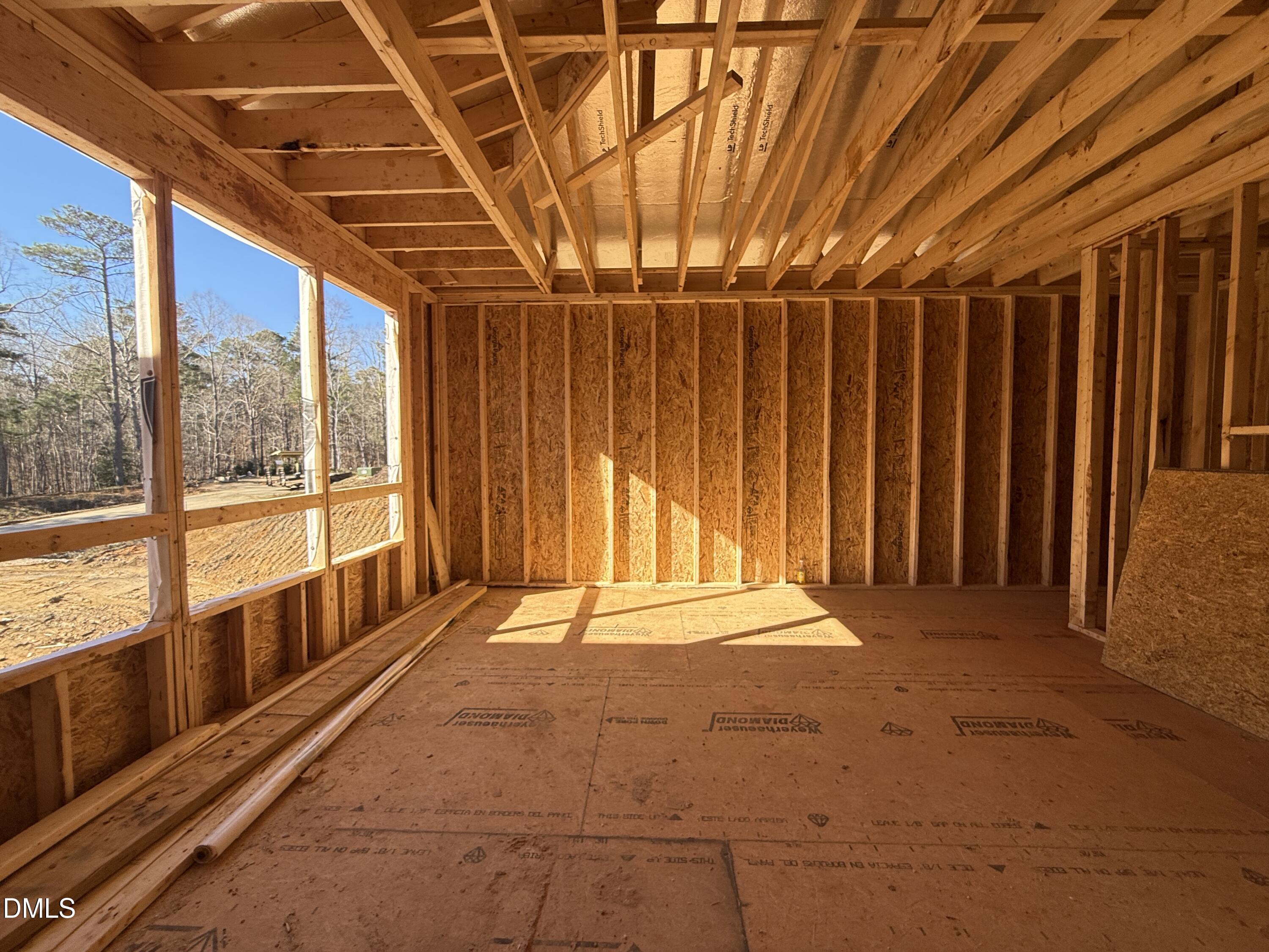 6820 Brixley Circle Raleigh, NC 27614 - Photo 24 of 35 a view of an empty room with a sliding door