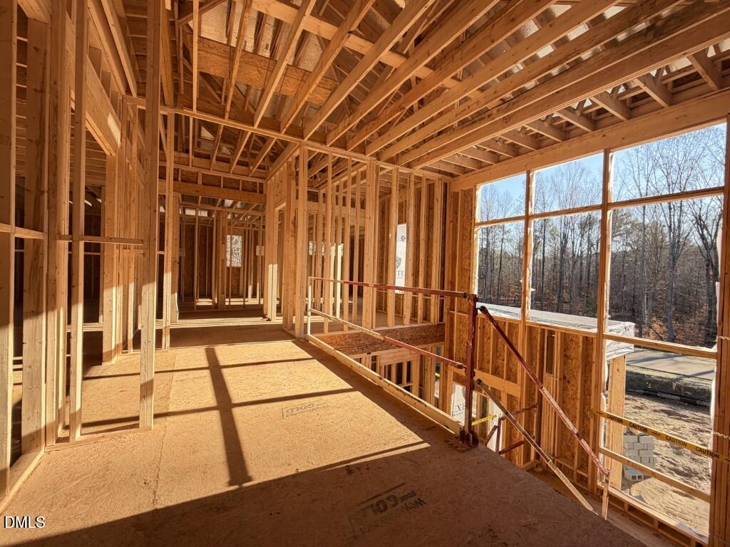 6820 Brixley Circle Raleigh, NC 27614 - Photo 32 of 38 a view of an empty room with a balcony
