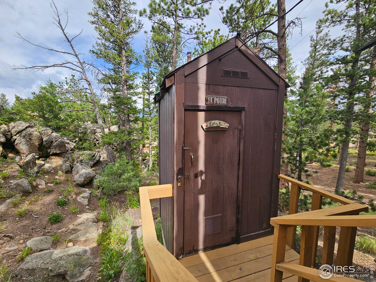 265 Onawa Road Red Feather Lakes, CO 80545 - Photo 14 of 15 Well maintained outhouse