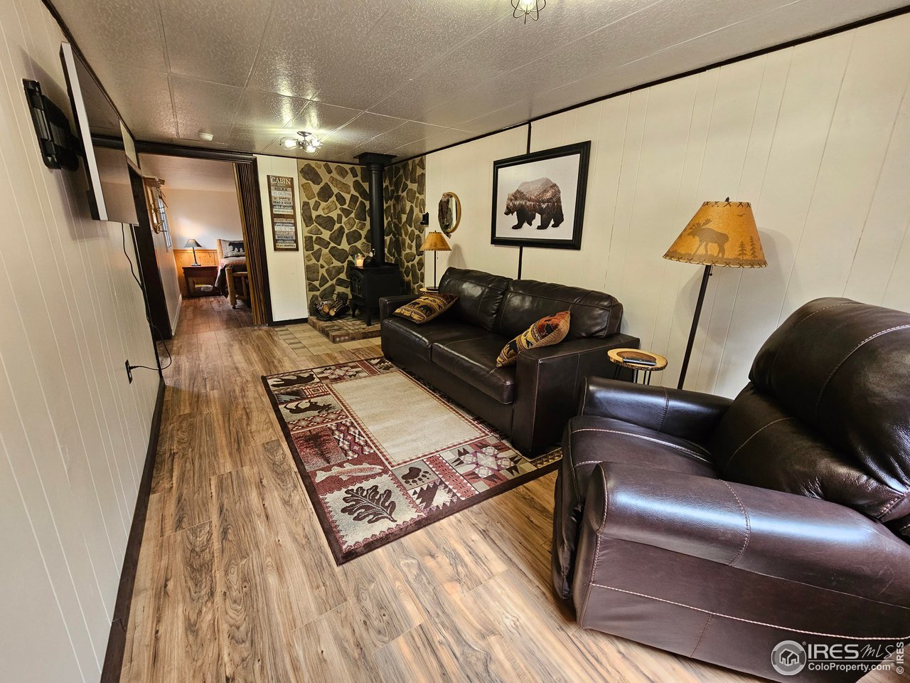 265 Onawa Road Red Feather Lakes, CO 80545 - Photo 5 of 15 Cozy living room