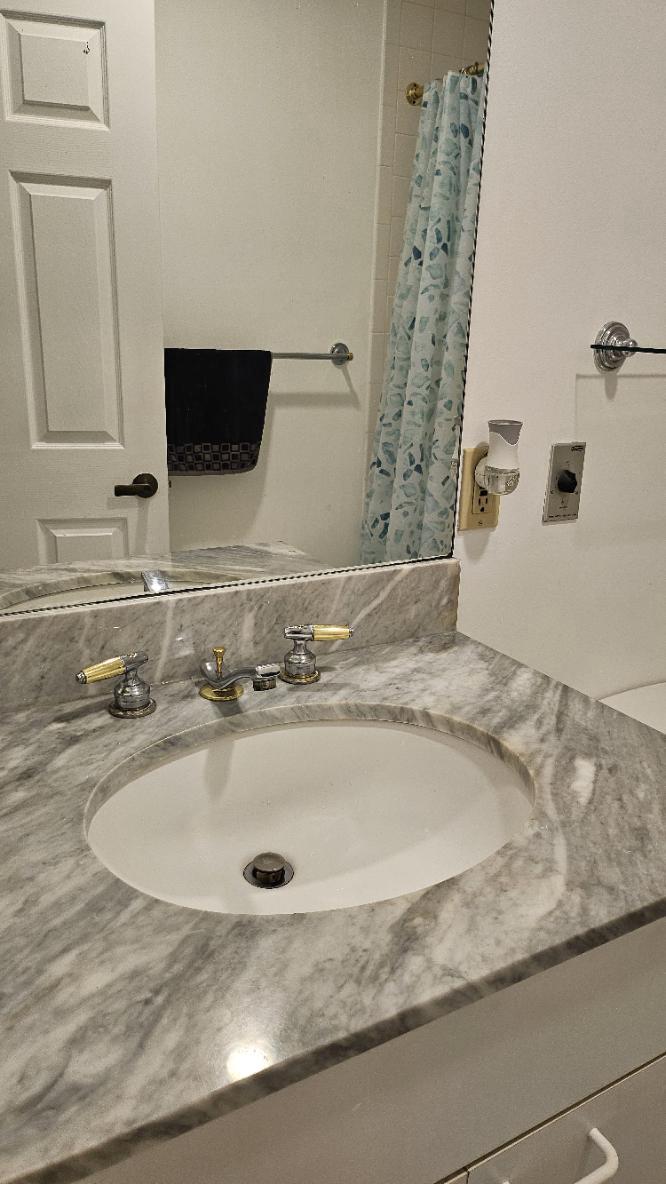 3801 Canterbury Road, Unit 409 Baltimore, MD 21218 - Photo 16 of 31 2nd Bathroom Marble Vanity