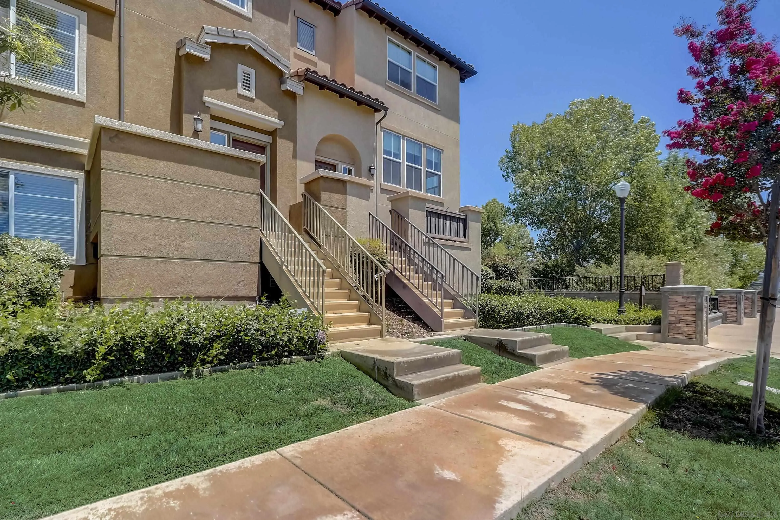 10185 Leavesly Trail Santee, CA 92071 - Photo 11 of 27 a front view of a house with a yard