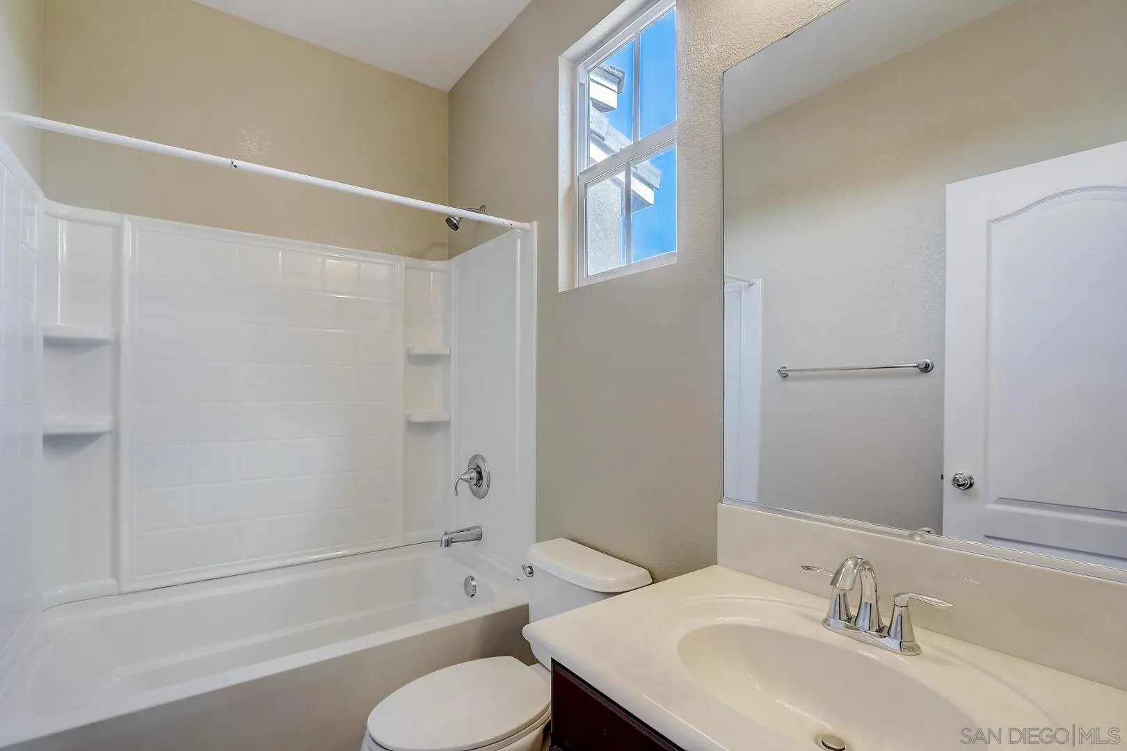 10185 Leavesly Trail Santee, CA 92071 - Photo 12 of 27 a bathroom with a sink toilet and shower