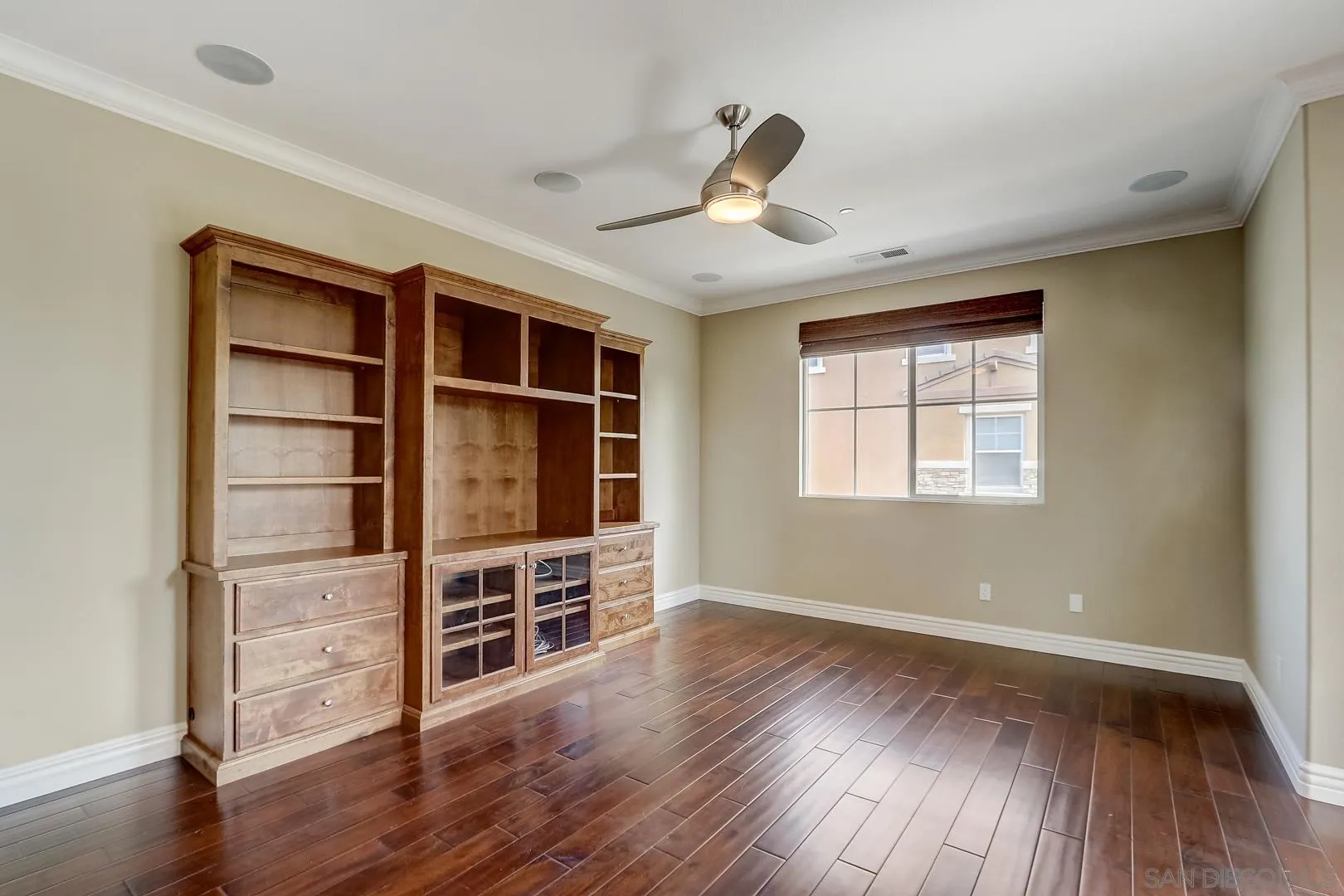 10185 Leavesly Trail Santee, CA 92071 - Photo 18 of 27 a view of an empty room with a window and wooden floor
