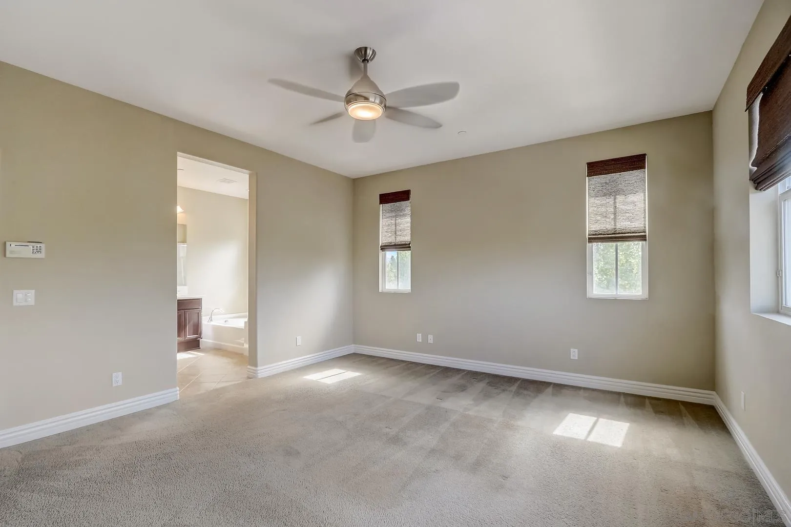 10185 Leavesly Trail Santee, CA 92071 - Photo 9 of 27 wooden floor in an empty room with a window