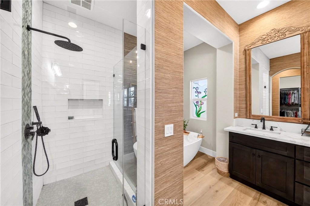 16375 Ory Circle Riverside, CA 92503 - Photo 31 of 51 a en suite bathroom with a double vanity sink toilet and shower