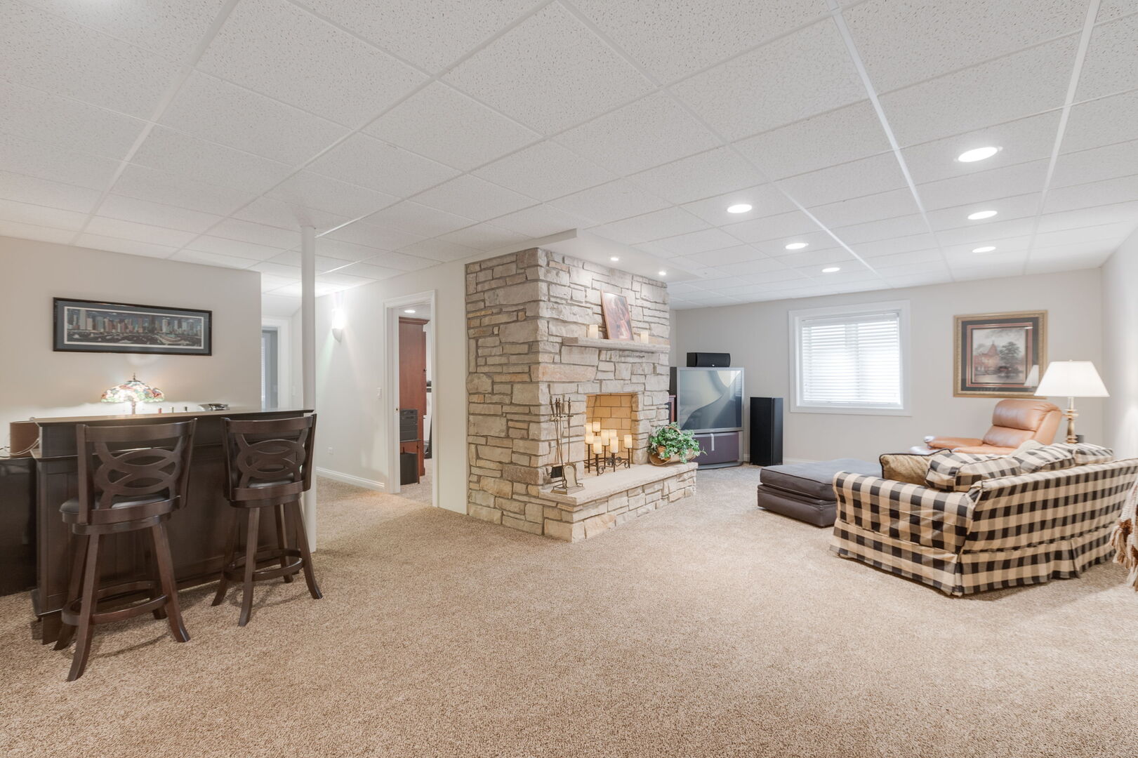 209 Carriage Trail Barrington, IL 60010 - Photo 30 of 42 a living room with furniture a desk and chair