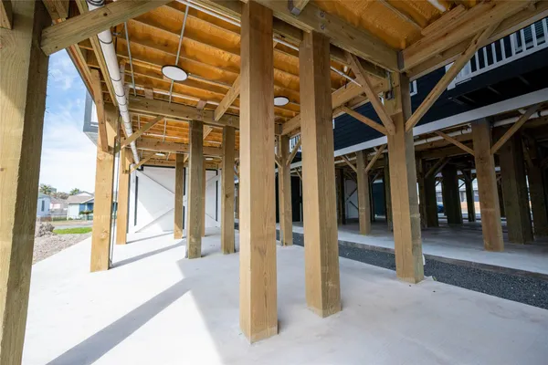 a view of a porch with a door and chair