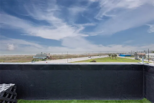 a view of a swimming pool and an outdoor space