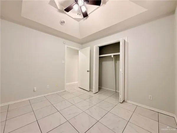 a view of an empty room and window