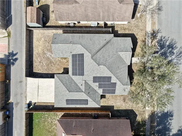 an aerial view of a house with garden