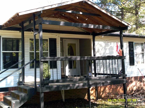 a view of a house with wooden floor
