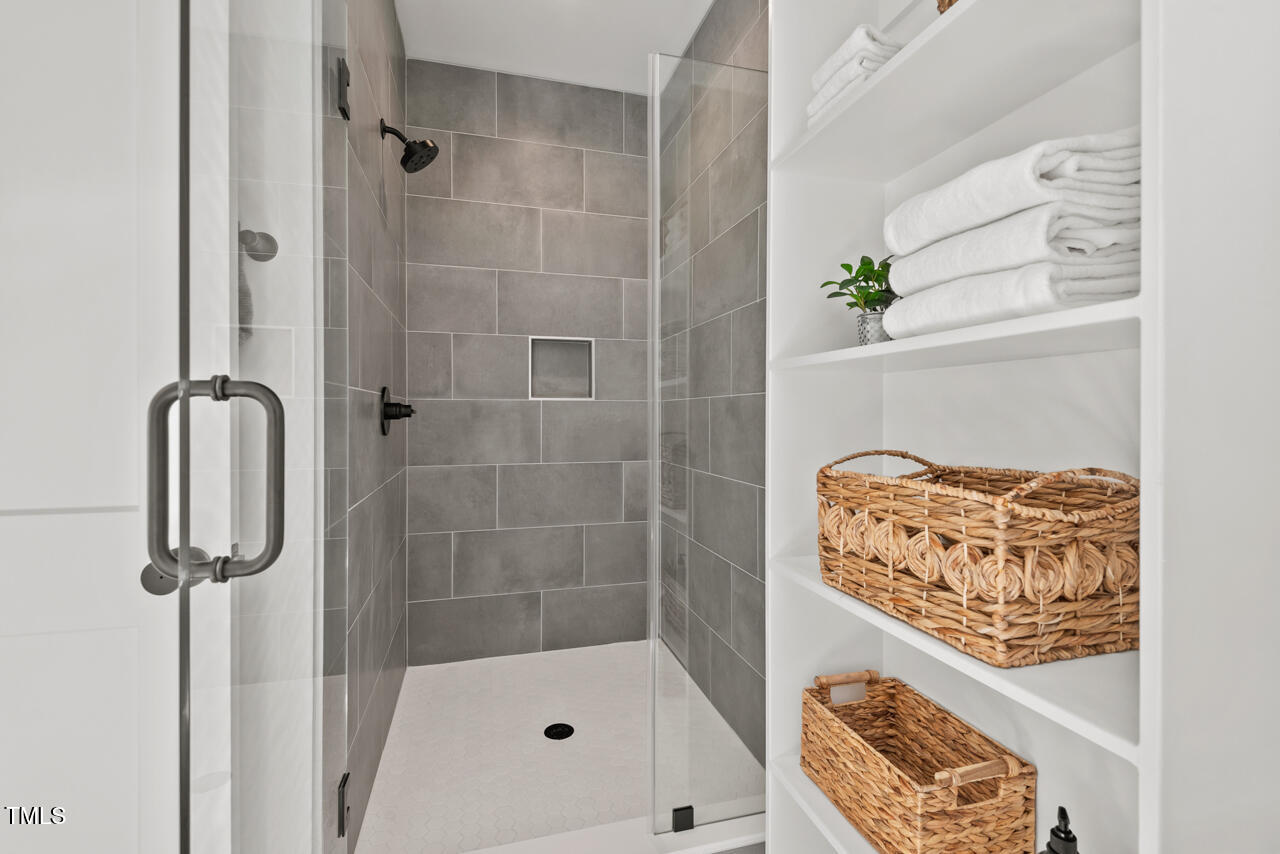2019 James Street Durham, NC 27707 - Photo 19 of 46 a bathroom with a shower