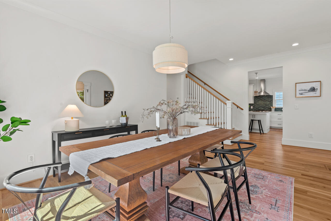 2019 James Street Durham, NC 27707 - Photo 22 of 46 a dining room with furniture and wooden floor