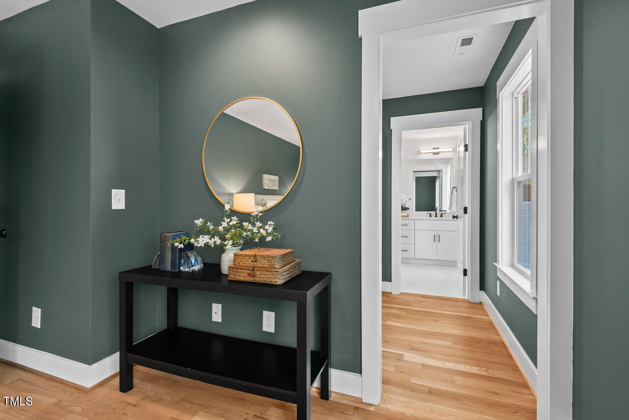 2019 James Street Durham, NC 27707 - Photo 33 of 46 a living room with furniture and a mirror
