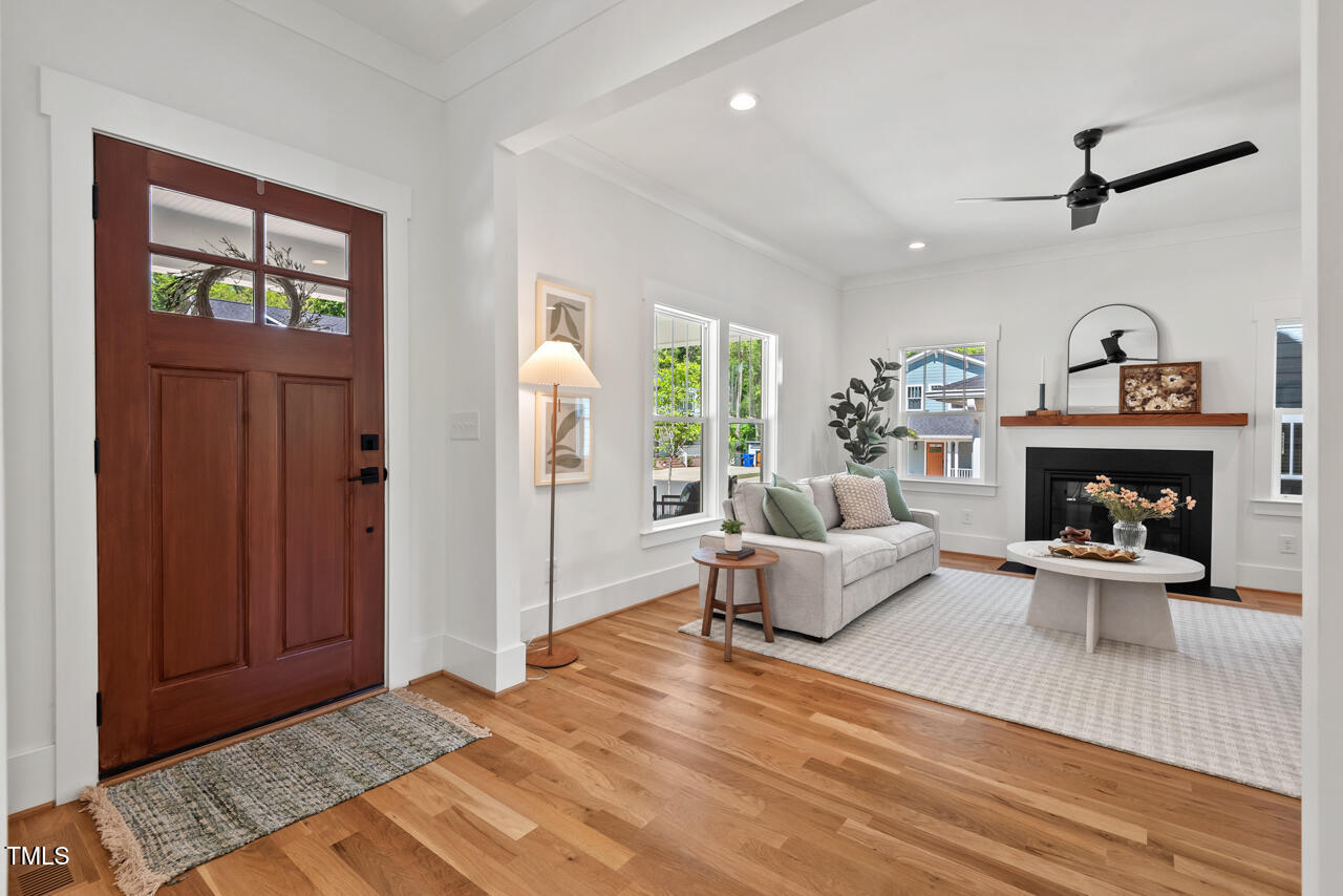 2019 James Street Durham, NC 27707 - Photo 4 of 46 a living room with furniture and a fireplace