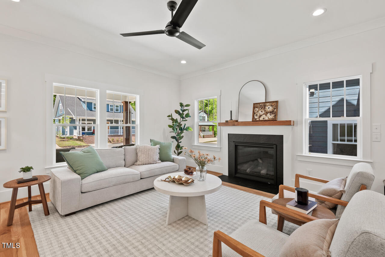 2019 James Street Durham, NC 27707 - Photo 6 of 46 a living room with furniture and a fireplace