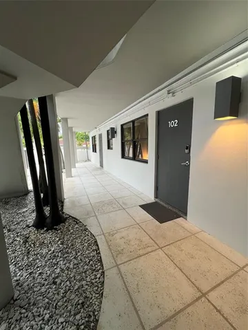 a view of a livingroom with a staircase