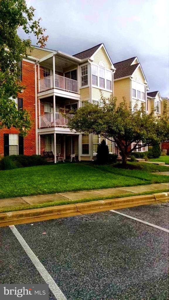 741 Deering Road, Unit 6L Pasadena, MD 21122 - Photo 1 of 12 Front of building with parking.