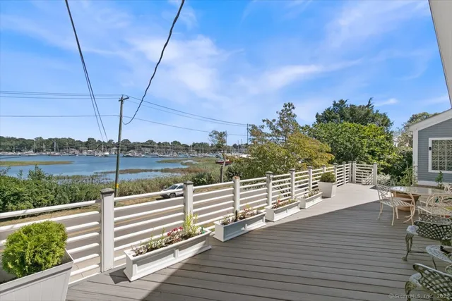a view of a roof deck with couches