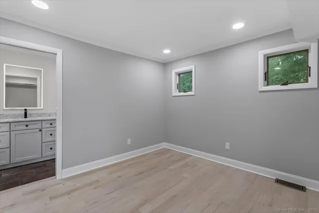 an empty room with windows