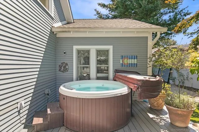 a view of a patio with a table and chairs