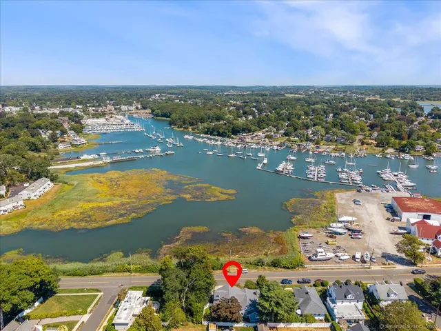 an aerial view of swimming pool patio and mountain view