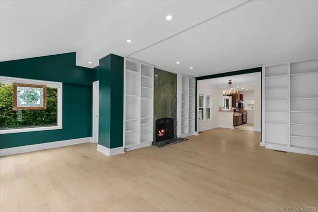 a view of livingroom with an empty space and window