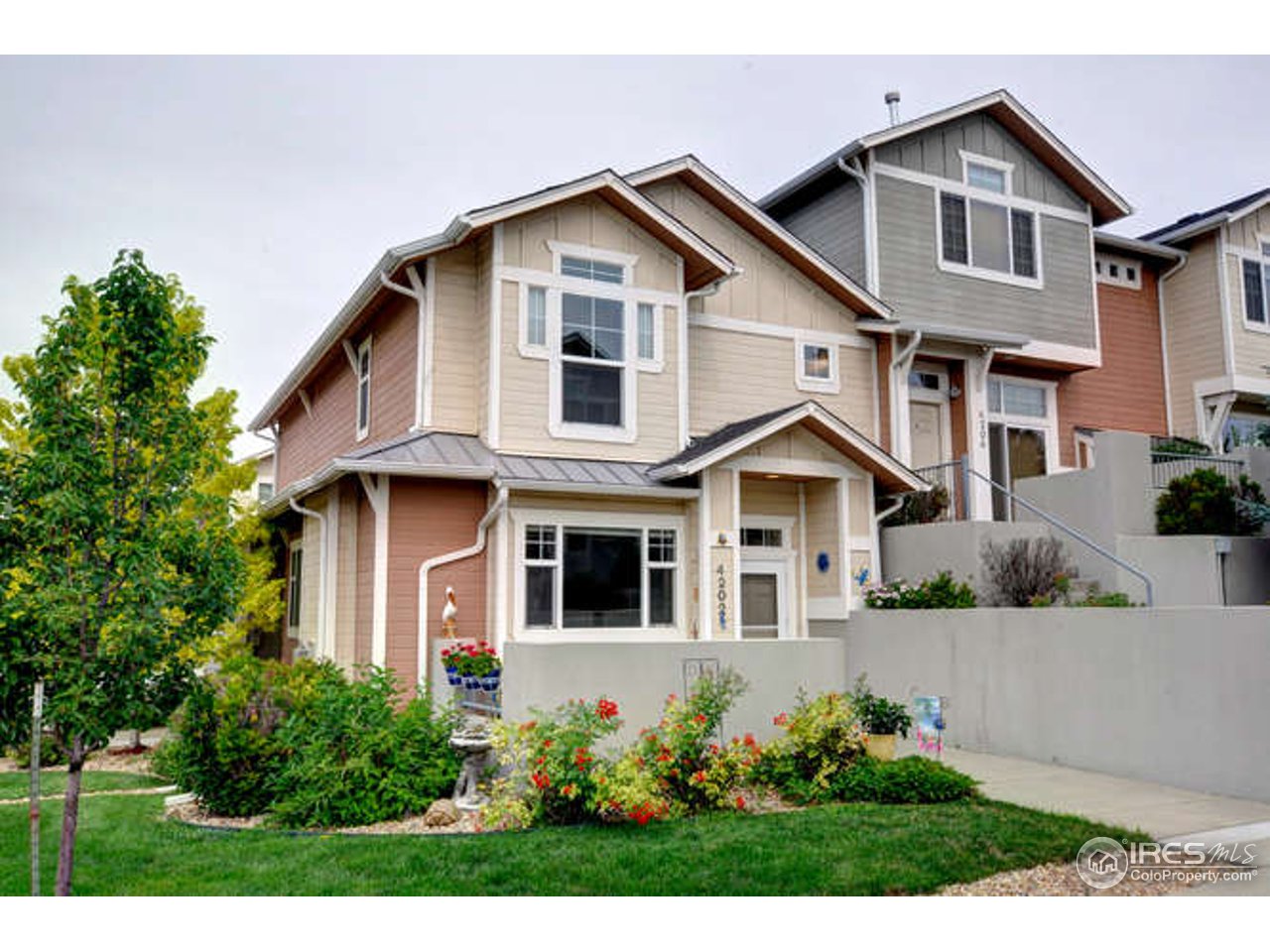 4202 Riley Drive Longmont, CO 80503 - Photo 1 of 25 East side of townhome